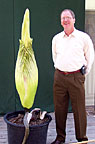 man posing with Amorphophallus